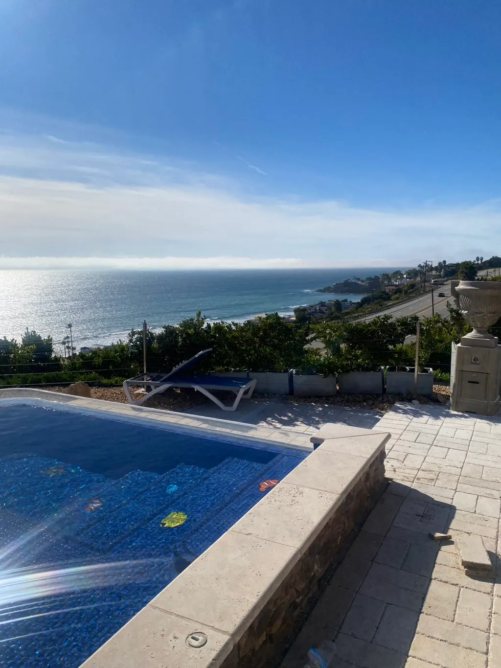 Pool-deck view of a coastal Florida property — the kind of high-humidity environment that drives mold growth in SWFL.